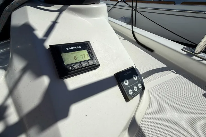 Slide: The Image of Cockpit of 2022 Beneteau Oceanis 40.1 sailboat with steering wheel and navigation instruments. - 67