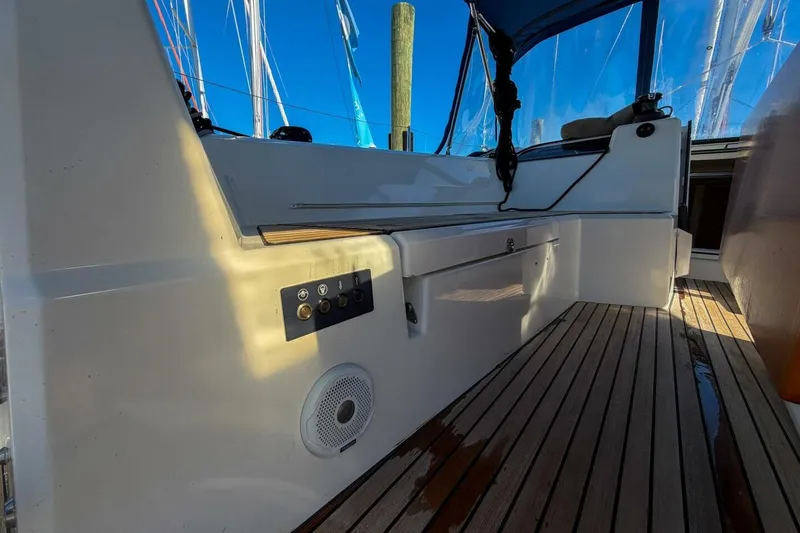 Slide: The Image of Beneteau Oceanis 40.1 sailboat deck with winch and ropes, docked in marina, 2022 model. - 74