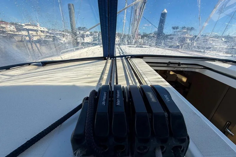 Slide: The Image of 2022 Beneteau Oceanis 40.1 yacht deck with winch and hatch view. - 81