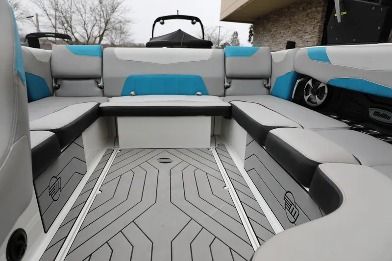 Slide: The Image of Interior of 2018 Malibu Wakesetter 23 LSV boat with gray and blue seating. - 3