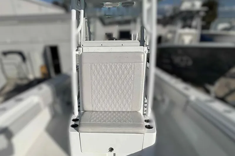 Slide: The Image of 2023 Andros Offshore 32 boat seat with diamond-patterned upholstery. - 7