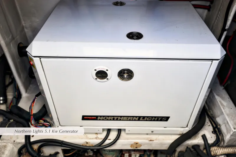Slide: The Image of Northern Lights 5.1 kW generator in 2000 Cabo 35 Express boat. - 27