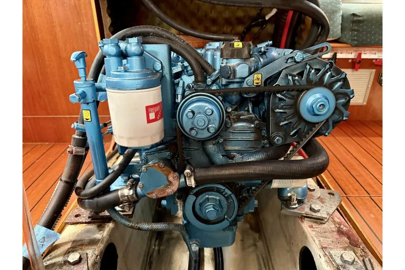 Slide: The Image of Engine of a 2000 Beneteau Oceanis 461 sailboat, showcasing detailed mechanical components. - 44