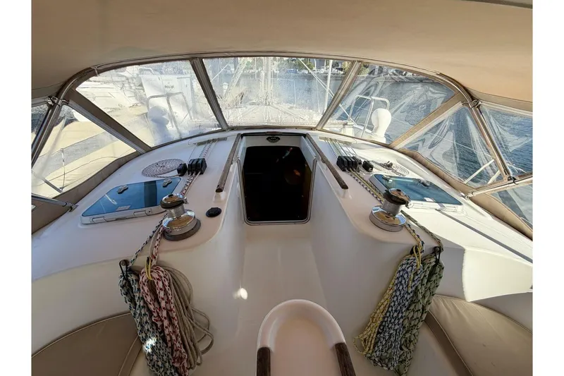 Slide: The Image of Cockpit view of 2000 Beneteau Oceanis 461 sailboat with ropes and winches. - 51
