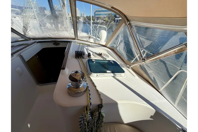 Slide: The Image of Cockpit view of 2000 Beneteau Oceanis 461 sailboat with winch and ropes. - 53
