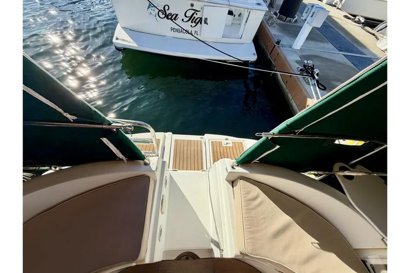 Slide: The Image of Beneteau Oceanis 461 sailboat stern view, docked at marina, 2000 model. - 58