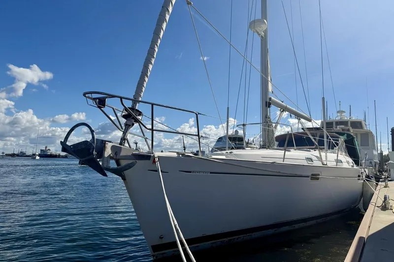 Slide: The Image of 2000 Beneteau Oceanis 461 sailboat docked under clear blue sky. - 70
