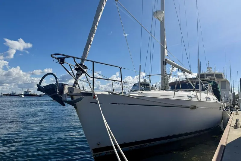 Slide: The Image of Beneteau Oceanis 461 sailboat docked at marina, 2000 model, under clear blue sky. - 71