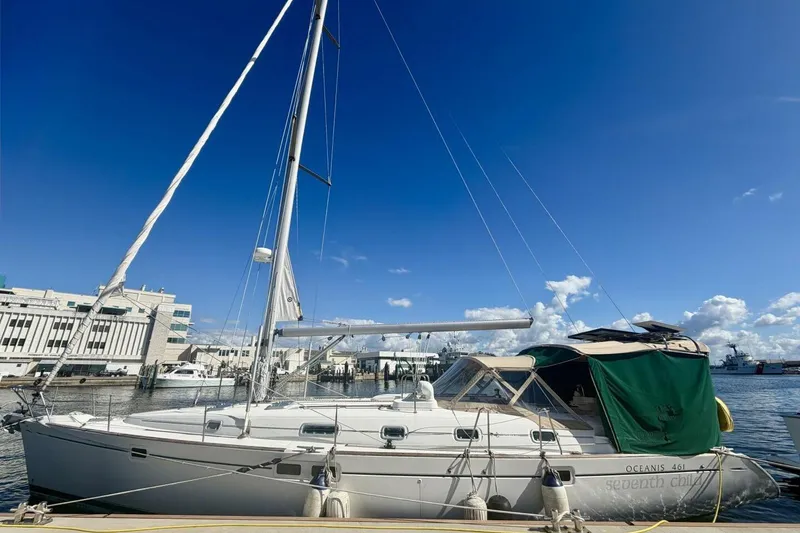 Slide: The Image of 2000 Beneteau Oceanis 461 sailboat docked under clear blue sky. - 72