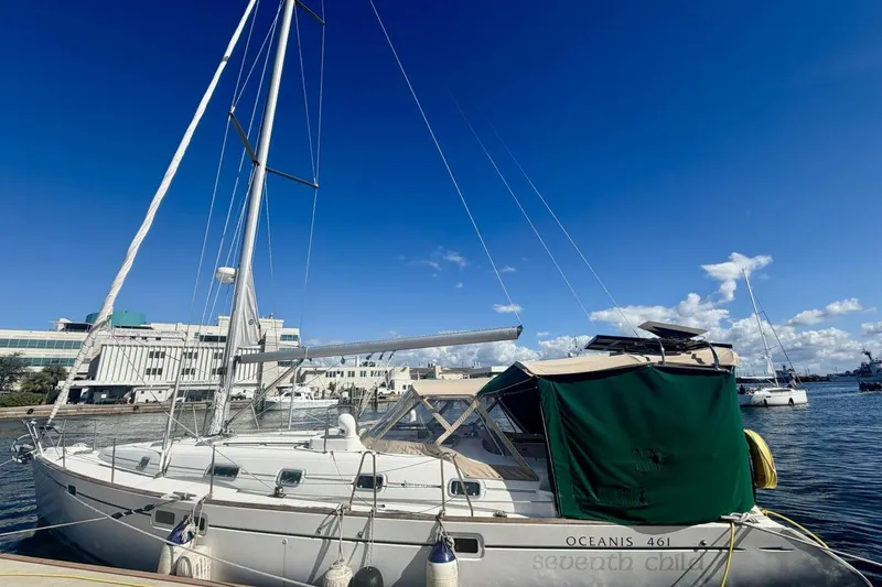 Slide: The Image of 2000 Beneteau Oceanis 461 sailboat docked under clear blue sky. - 73