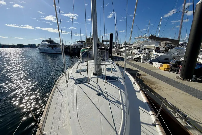 Slide: The Image of Beneteau Oceanis 461 sailboat docked at marina, sunny day, 2000 model. - 86