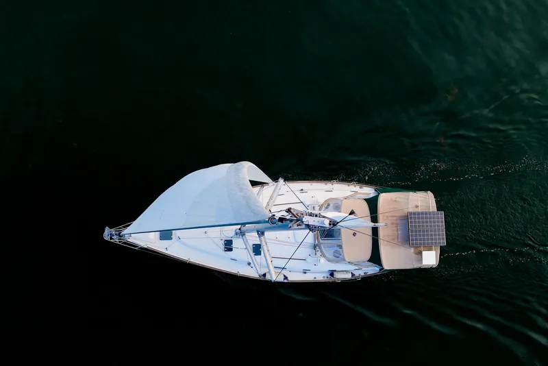 Slide: The Image of Aerial view of 2000 Beneteau Oceanis 461 sailboat with solar panel on deck. - 93