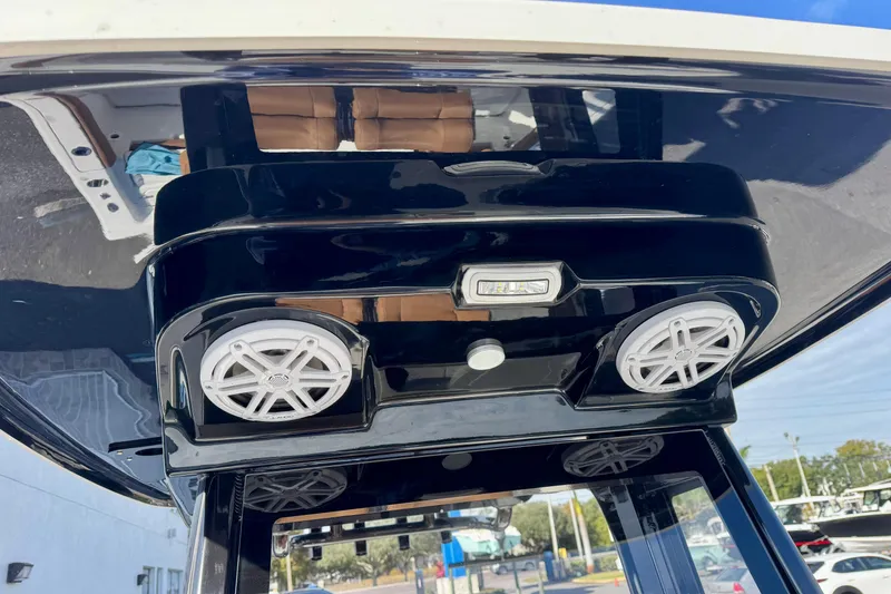 Slide: The Image of 2026 Key West 230 Bay Reef boat speakers and light on black console. - 31