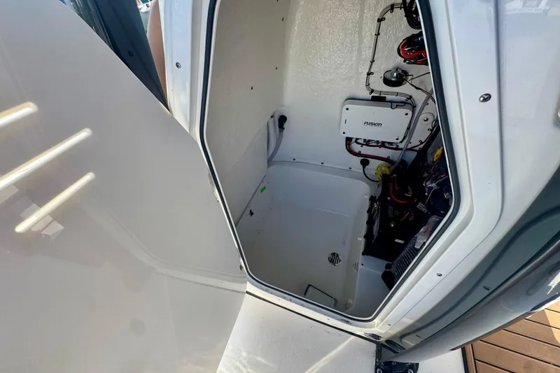 Slide: The Image of 2026 Key West 230 Bay Reef boat interior with wiring and equipment. - 36