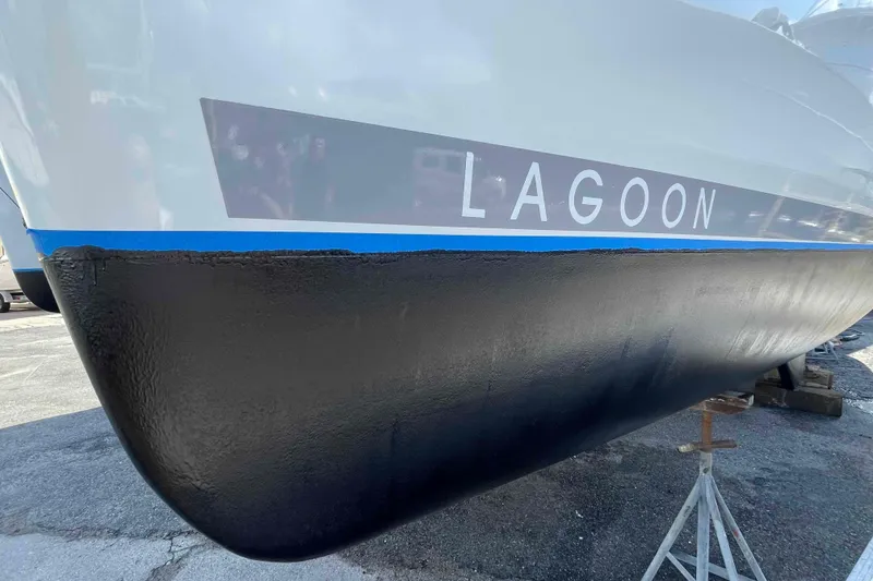 Slide: The Image of Steering wheel and navigation equipment on a 2012 Lagoon 380 S2 catamaran. - 19