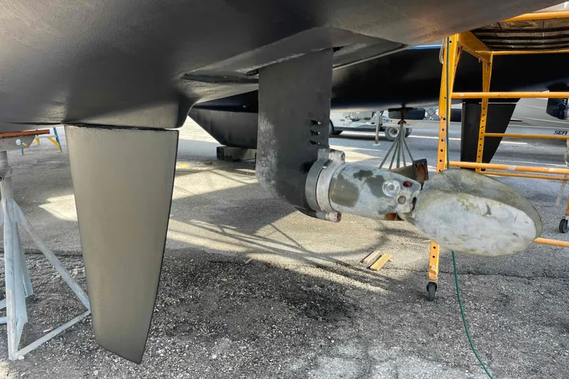 Slide: The Image of Interior of 2012 Lagoon 380 S2 catamaran with cozy seating and modern kitchen amenities. - 21