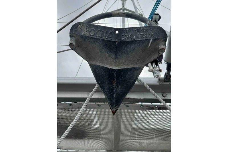 Slide: The Image of Cozy bedroom interior of 2012 Lagoon 380 S2 catamaran with comfortable bedding. - 42