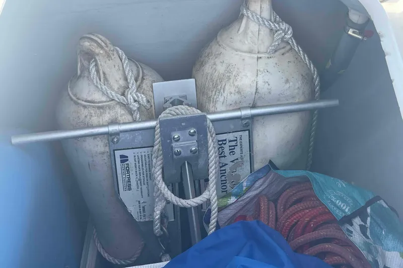 Slide: The Image of Interior of 2012 Lagoon 380 S2 catamaran showing a closed white cabinet door. - 49