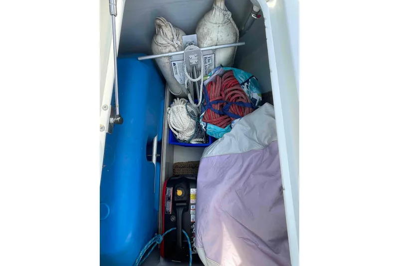 Slide: The Image of Control panel of a 2012 Lagoon 380 S2 catamaran with navigation and communication equipment. - 50