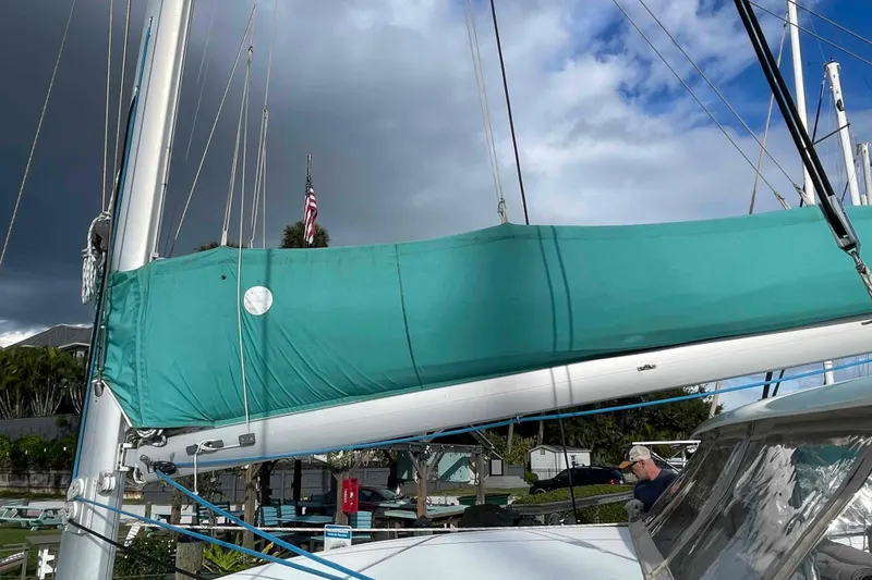 Slide: The Image of Propeller and rudder of 2012 Lagoon 380 S2 catamaran on dry dock. - 62