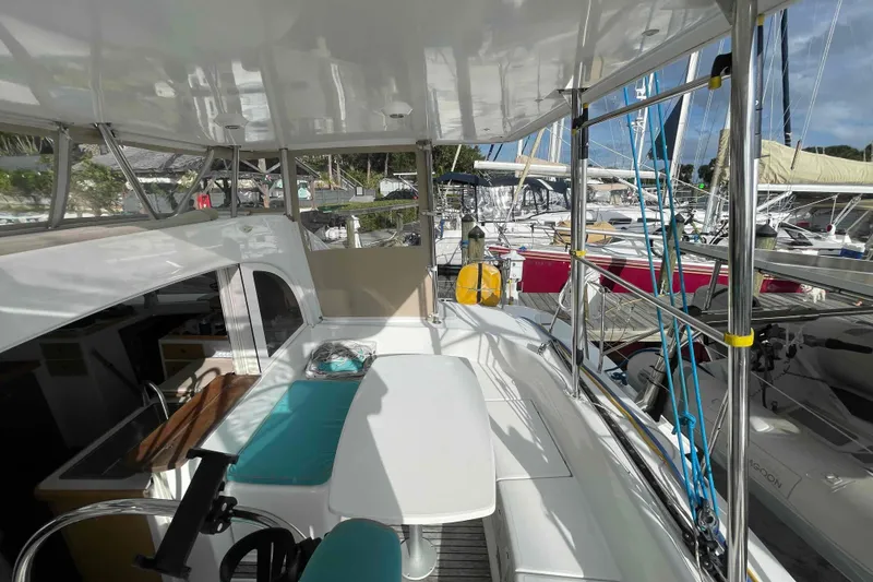 Slide: The Image of Yellow power cables on a 2012 Lagoon 380 S2 yacht's exterior. - 79