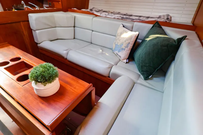 Slide: The Image of Luxurious interior of 2004 J Boats J/46 yacht with plush seating and elegant decor. - 24