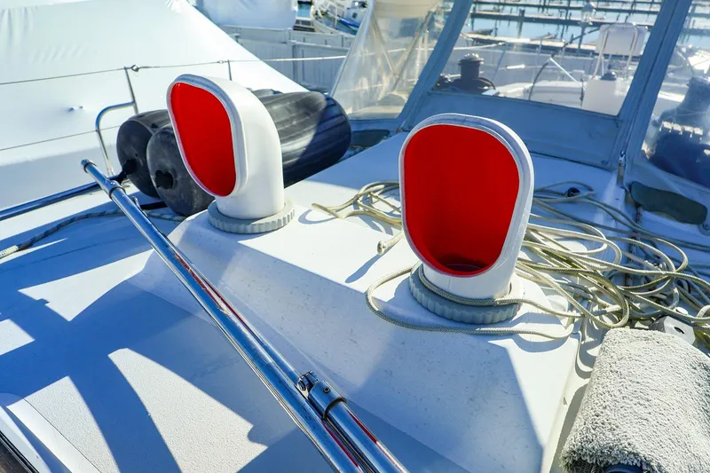 Slide: The Image of Deck of 2004 J Boats J/46 sailboat with red vents and ropes. - 9