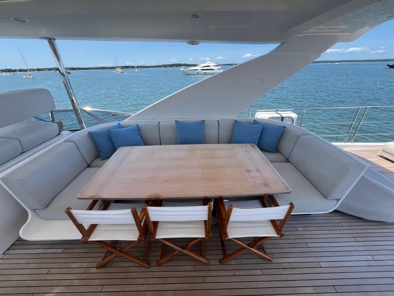 Slide: The Image of Outdoor seating area on 2019 Azimut Grande 27M yacht with ocean view. - 14
