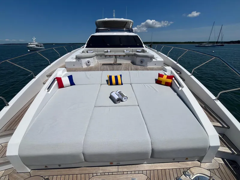Slide: The Image of Luxurious 2019 Azimut Grande 27M yacht with spacious sun deck and nautical cushions. - 18