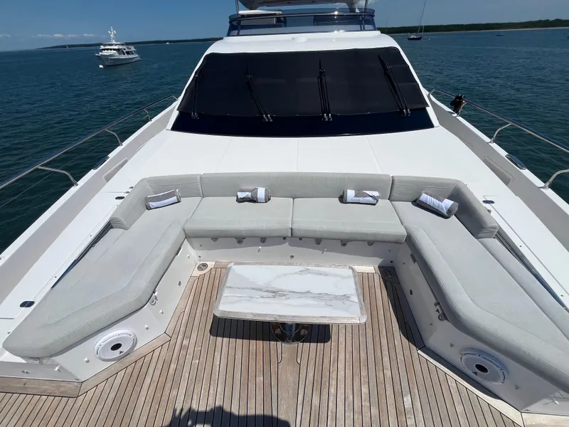 Slide: The Image of Luxurious 2019 Azimut Grande 27M yacht with spacious deck seating and ocean view. - 20