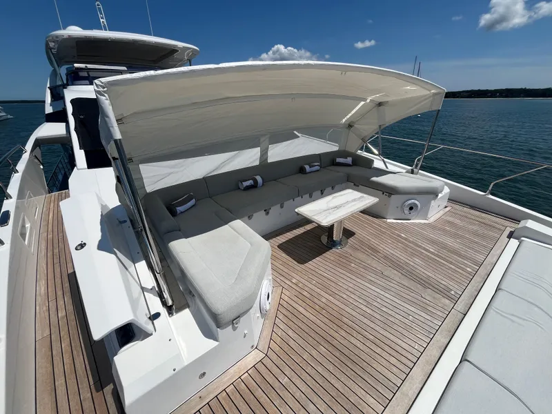 Slide: The Image of Luxurious 2019 Azimut Grande 27M yacht with spacious deck and seating area. - 21