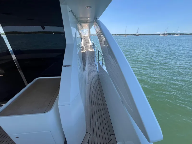 Slide: The Image of Side deck of 2019 Azimut Grande 27M yacht with ocean view. - 25