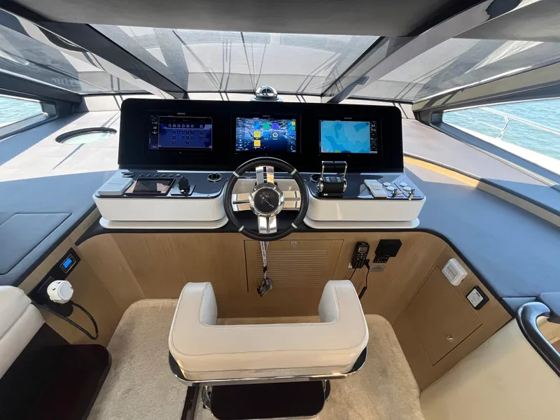 Slide: The Image of Helm of 2019 Azimut Grande 27M yacht with modern navigation displays. - 33