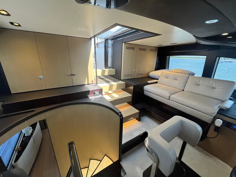 Slide: The Image of Luxurious interior of 2019 Azimut Grande 27M yacht with modern seating and elegant design. - 36