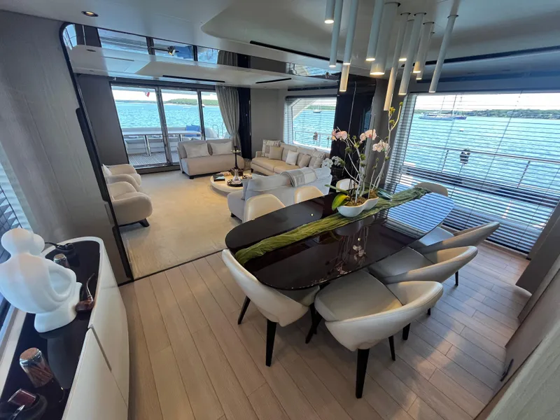 Slide: The Image of Luxurious interior of 2019 Azimut Grande 27M yacht with elegant dining and seating area. - 39