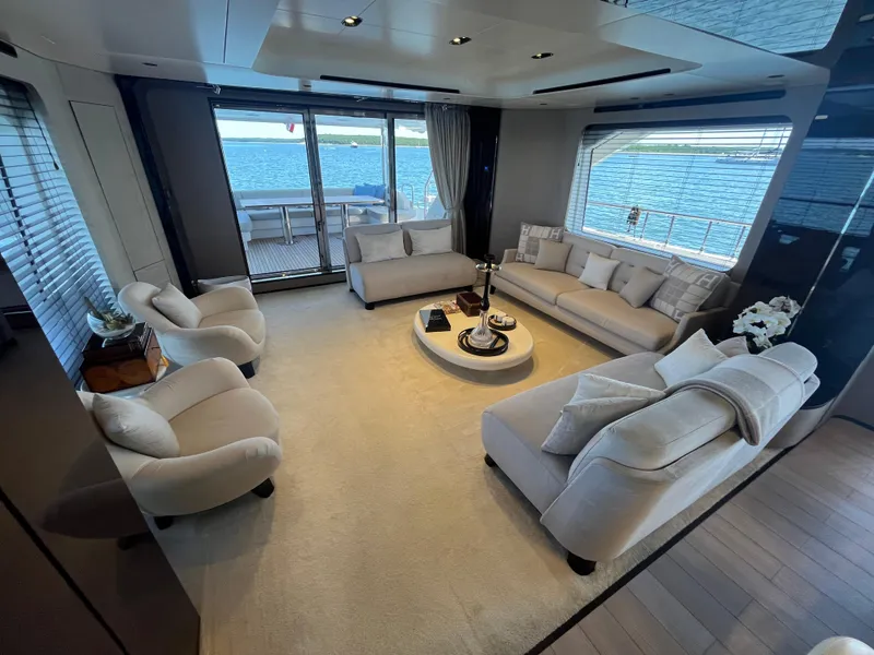 Slide: The Image of Luxurious interior of 2019 Azimut Grande 27M yacht with elegant seating and sea view. - 41