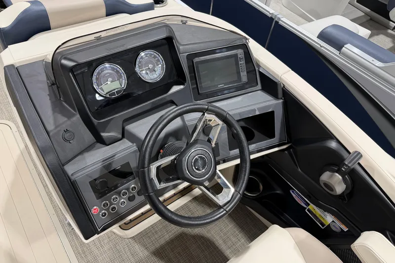 Slide: The Image of 2025 Avalon 2585 Catalina VRL boat dashboard with steering wheel and control panel. - 6