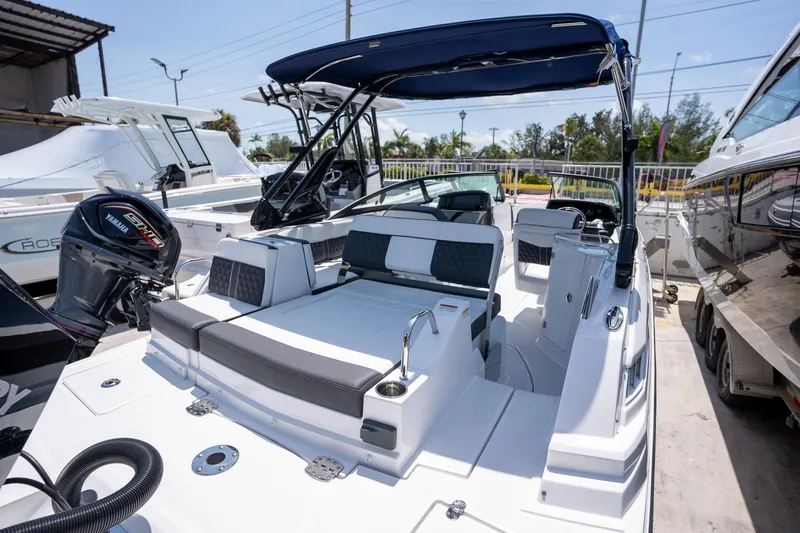 Slide: The Image of 2024 Monterey M-45 boat with Yamaha engine, sleek design, and spacious seating. - 10