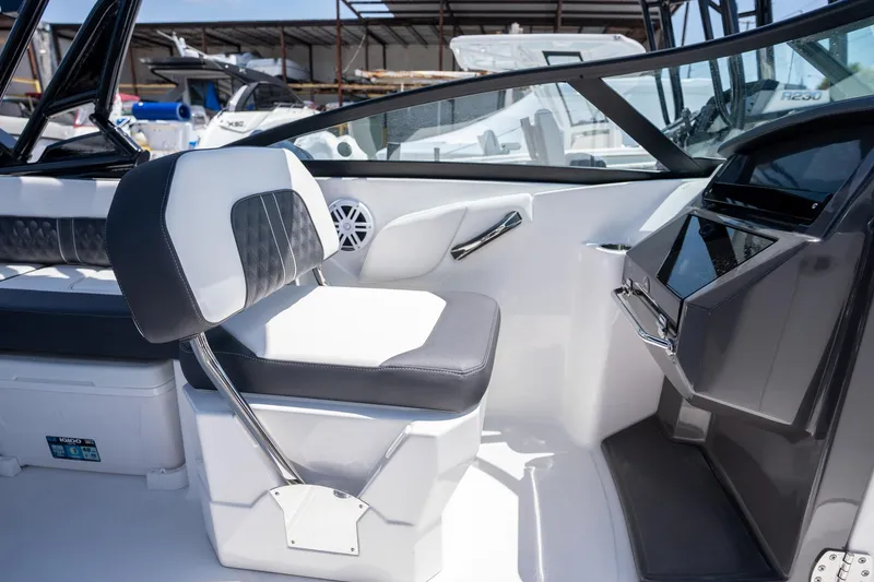 Slide: The Image of 2024 Monterey M-45 boat interior with modern seating and sleek dashboard design. - 17