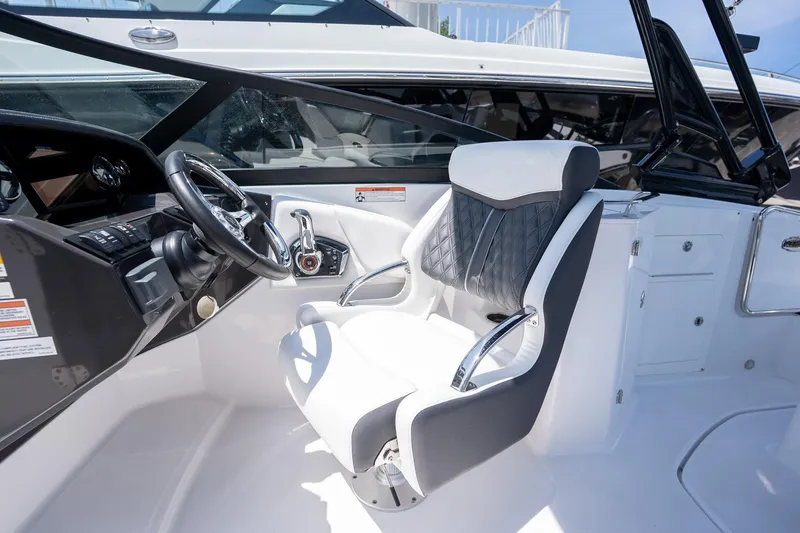 Slide: The Image of 2024 Monterey M-45 boat cockpit with modern steering and luxurious seating. - 18
