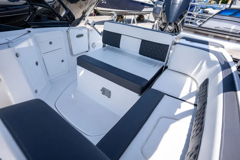Slide: The Image of 2024 Monterey M-45 boat interior with sleek seating and storage compartments. - 19