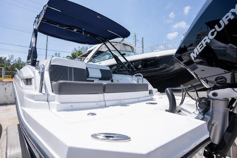 Slide: The Image of 2024 Monterey M-45 boat with Mercury engine, featuring sleek design and comfortable seating. - 3