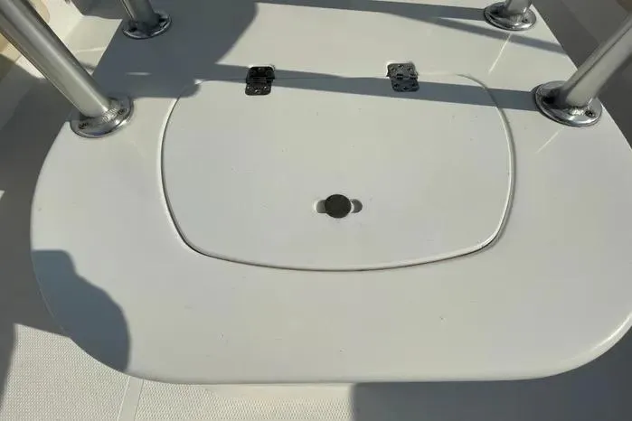 Slide: The Image of 2004 Kenner Fishmaster Travis Edition 220 boat interior with steering console and seating. - 17