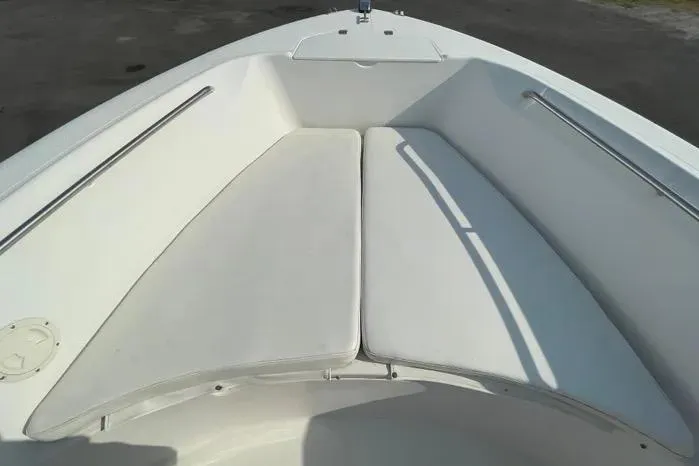 Slide: The Image of Storage compartment in 2004 Kenner Fishmaster boat with life jackets and equipment. - 38