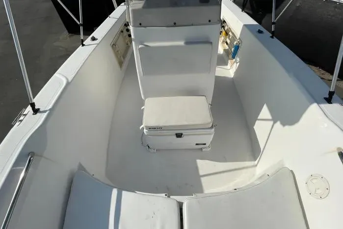 Slide: The Image of 2004 Kenner Fishmaster Travis Edition 220 with Igloo cooler seat on deck. - 45