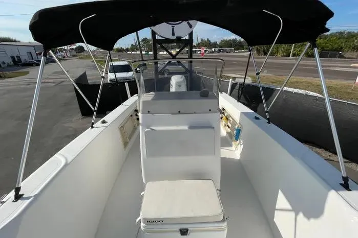 Slide: The Image of Open cooler with wire basket on Kenner Fishmaster Travis Edition 220, 2004 model. - 46