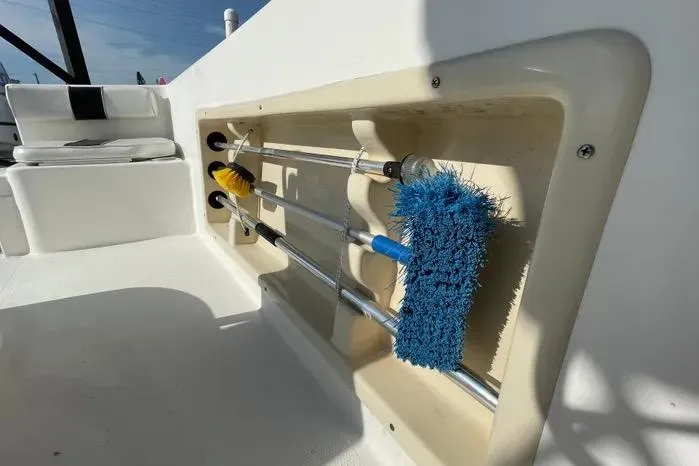 Slide: The Image of 2004 Kenner Fishmaster Travis Edition 220 boat interior storage compartment. - 50