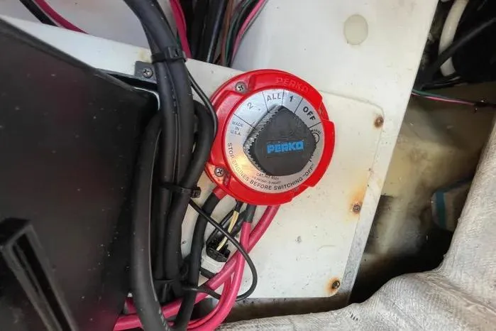 Slide: The Image of Storage compartment on 2004 Kenner Fishmaster Travis Edition 220 boat, containing cleaning supplies. - 60