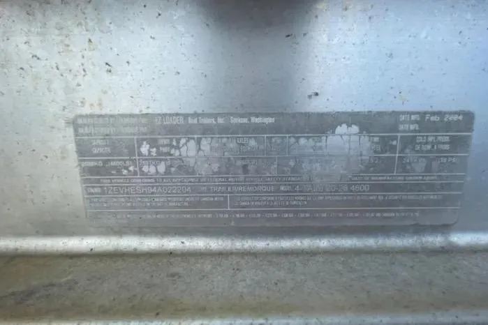 Slide: The Image of 2004 Kenner Fishmaster Travis Edition 220 identification plate with specifications and serial number. - 66