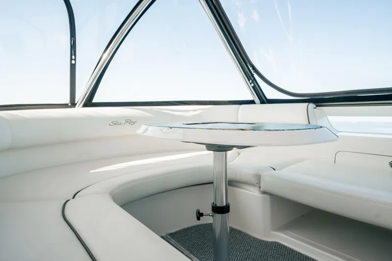 Slide: The Image of Luxurious interior of 2007 Sea Ray 580 Sedan Bridge yacht with sleek seating and table. - 15